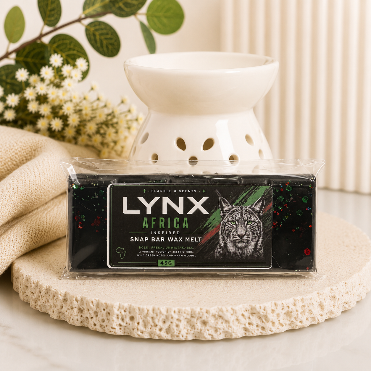 Lynx Africa Snap Bar Wax Melt by Sparkle & Scents, hand-poured soy wax melt in a segmented snap bar design. Inspired by the classic Lynx Africa fragrance with fresh citrus, lavender, warm spices, and woody musk notes. Perfect for use in electric and tealight wax warmers.