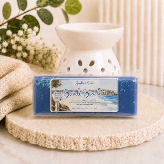 Bondi Beach Snap Bar Wax Melt handcrafted from natural soy wax, inspired by the fresh coastal atmosphere of Bondi Beach with sparkling citrus, soft florals, ocean breeze and white musk notes. Perfect for filling your home with a clean, beach-inspired fragrance.
