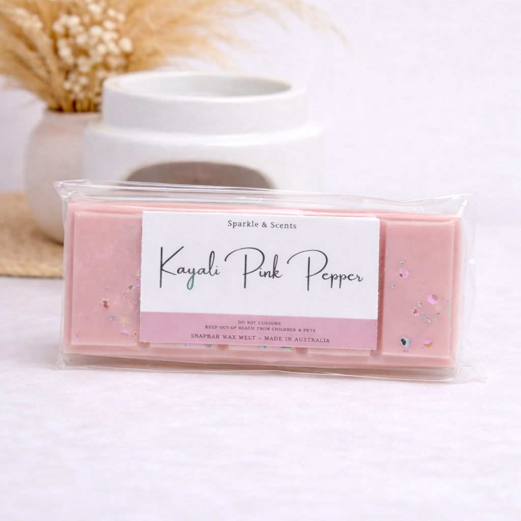 Pink wax melt package with 'Kayali Pink Pepper' branding on a white background