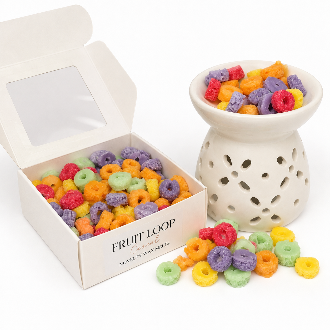 Colorful fruit loop-shaped wax melts in an open box and a decorative container.