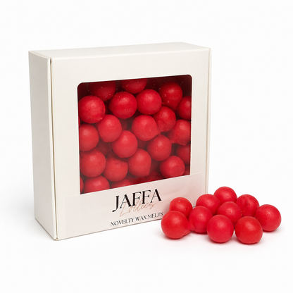 Box of Jaffa Novelty Wax Melts with red wax melts on a white background
