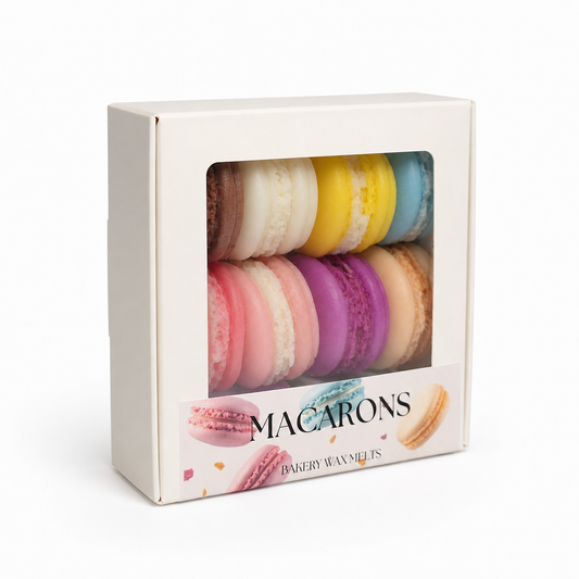 Box of colorful macaron wax melts with a clear window on a white background