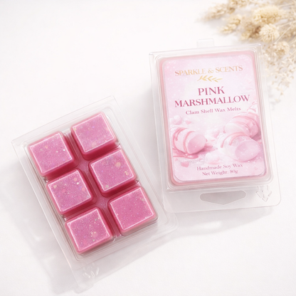 Pink marshmallow wax melts in a clear packaging with a branded label on a white background.