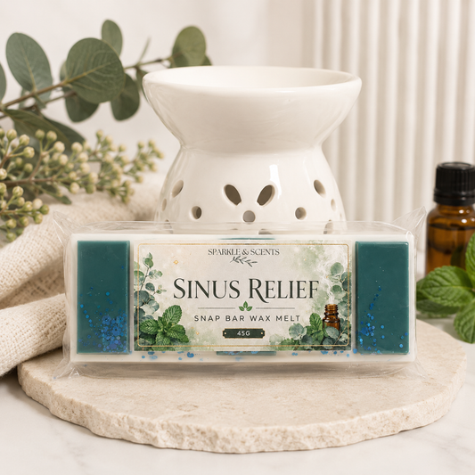 Sinus Relief wax melt packaging with a white ceramic warmer on a neutral background